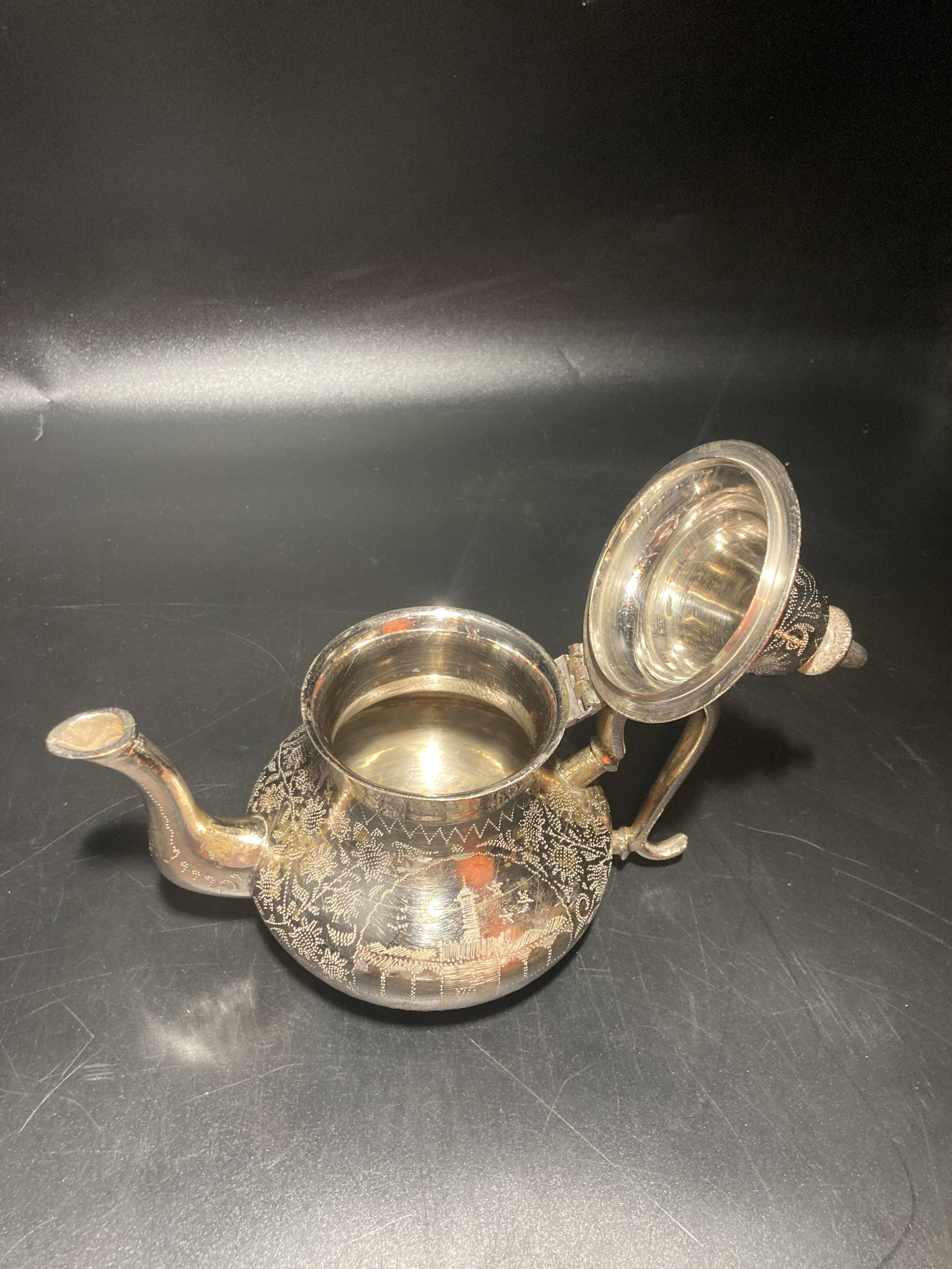 Silver metal teapot