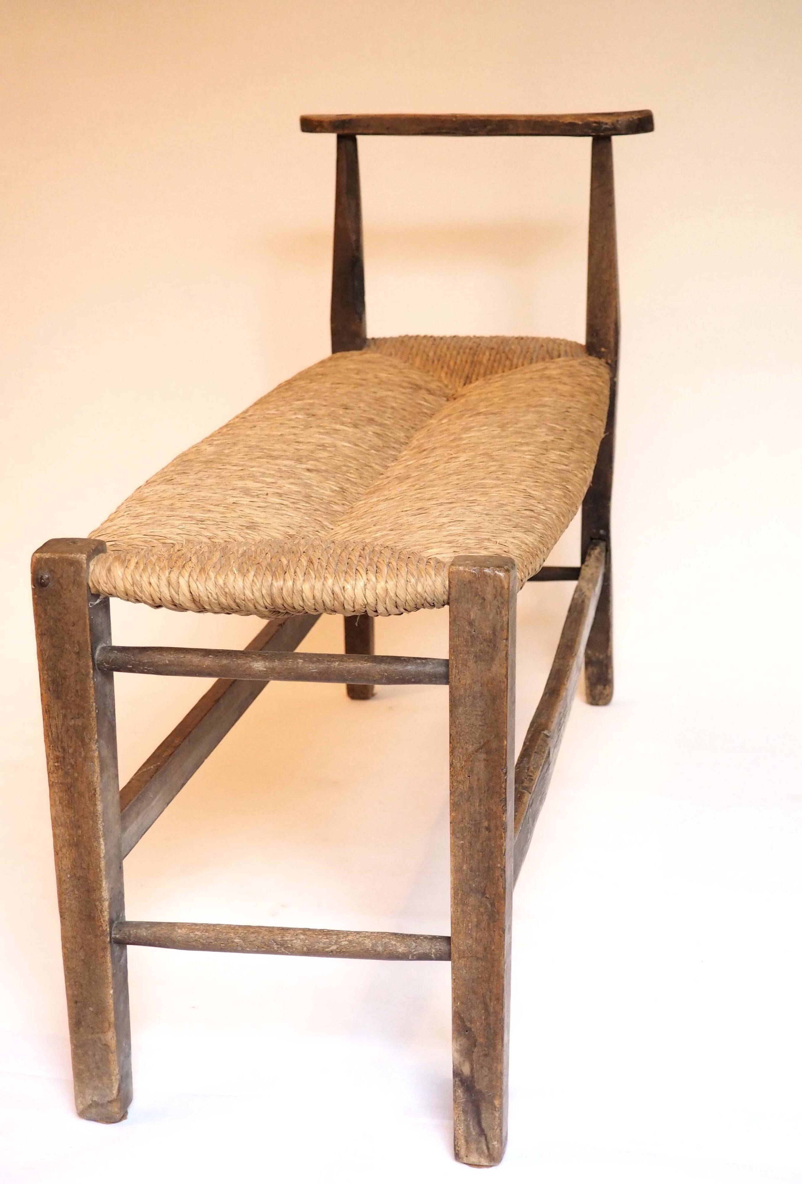 Straw and old wood bench