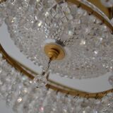 Old chandelier with tassels and brass