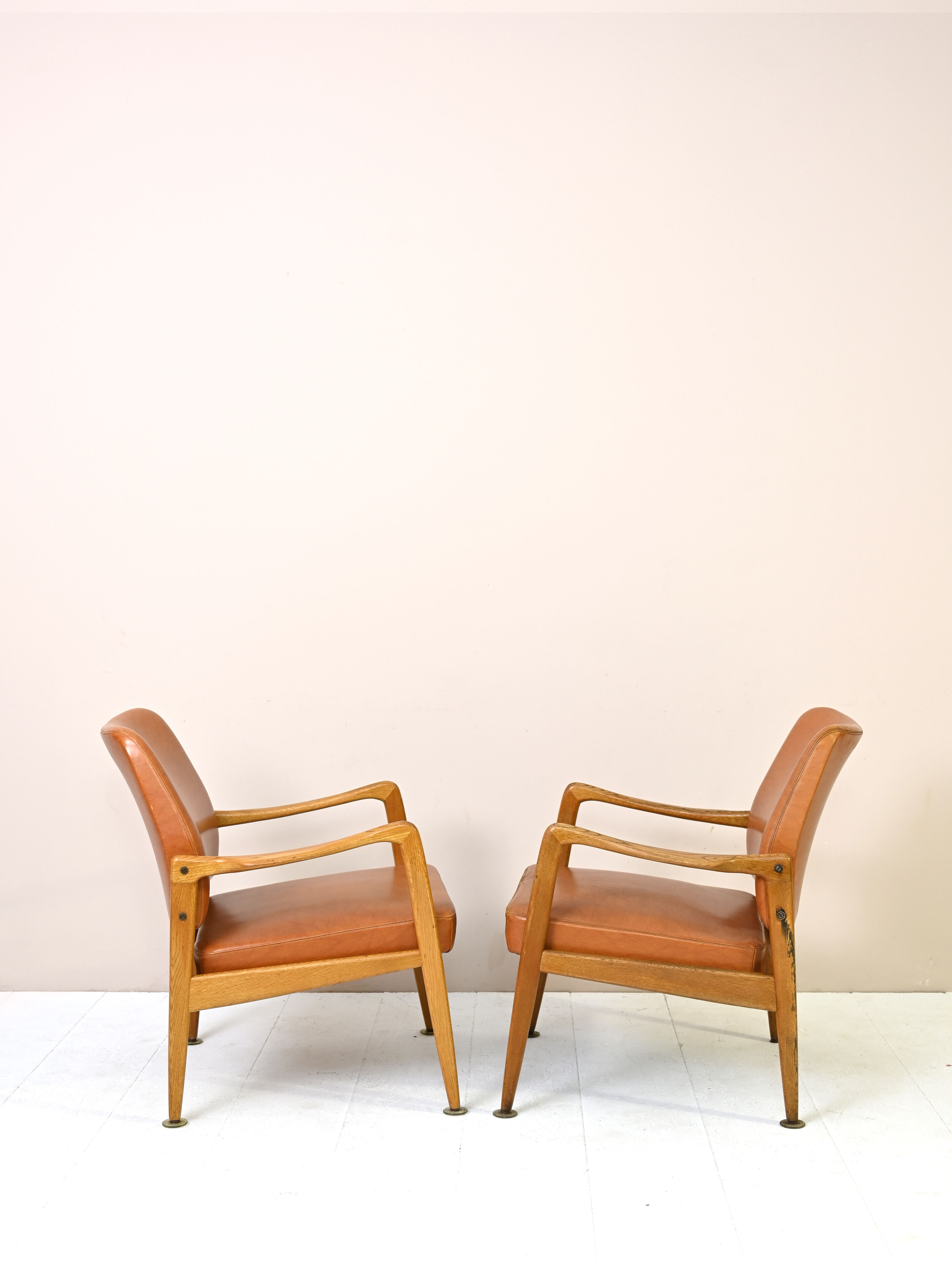 Pair of vintage Danish teak and leather armchairs