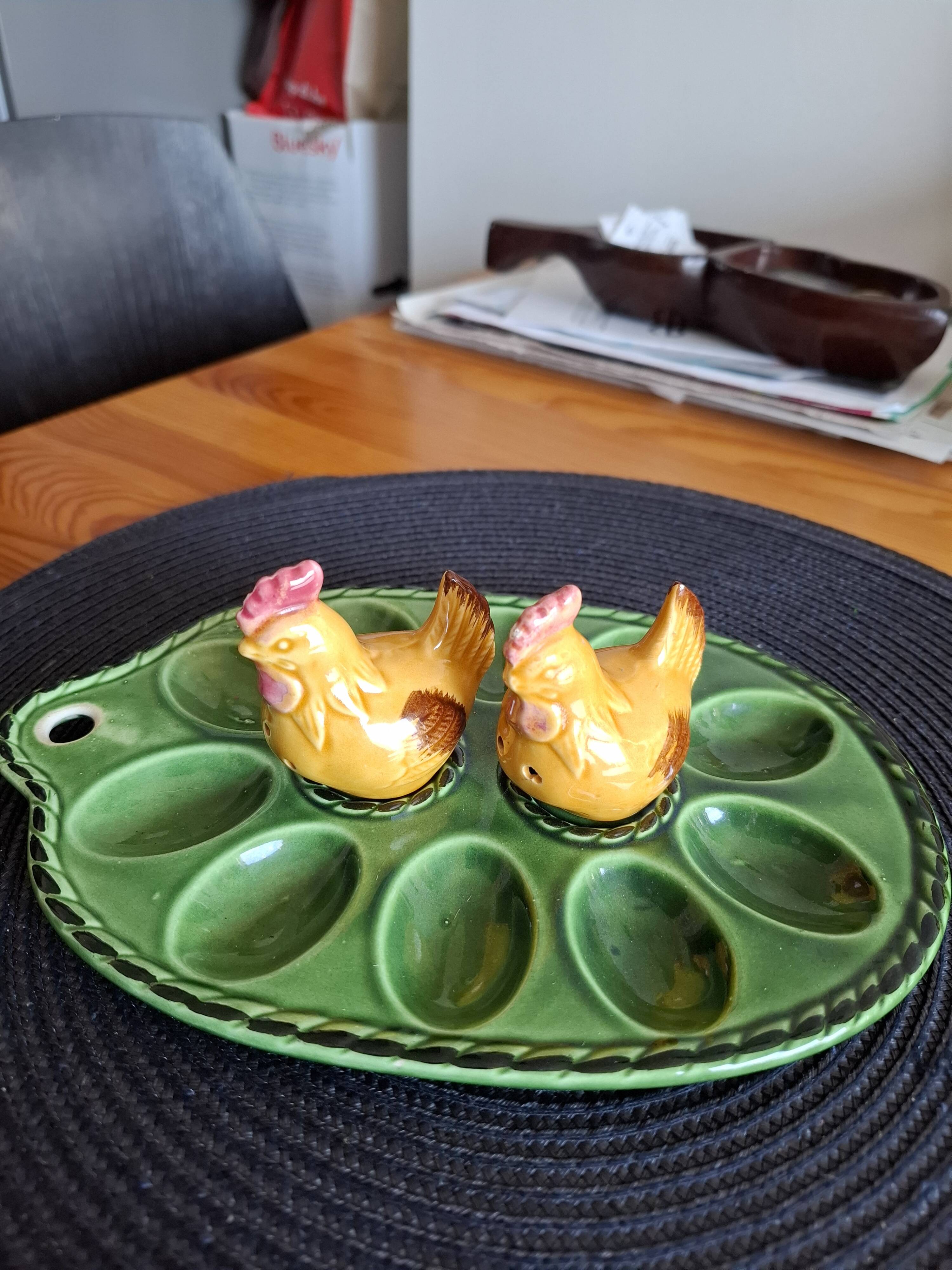 Earthenware egg dish with chicken-shaped salt and pepper shakers
