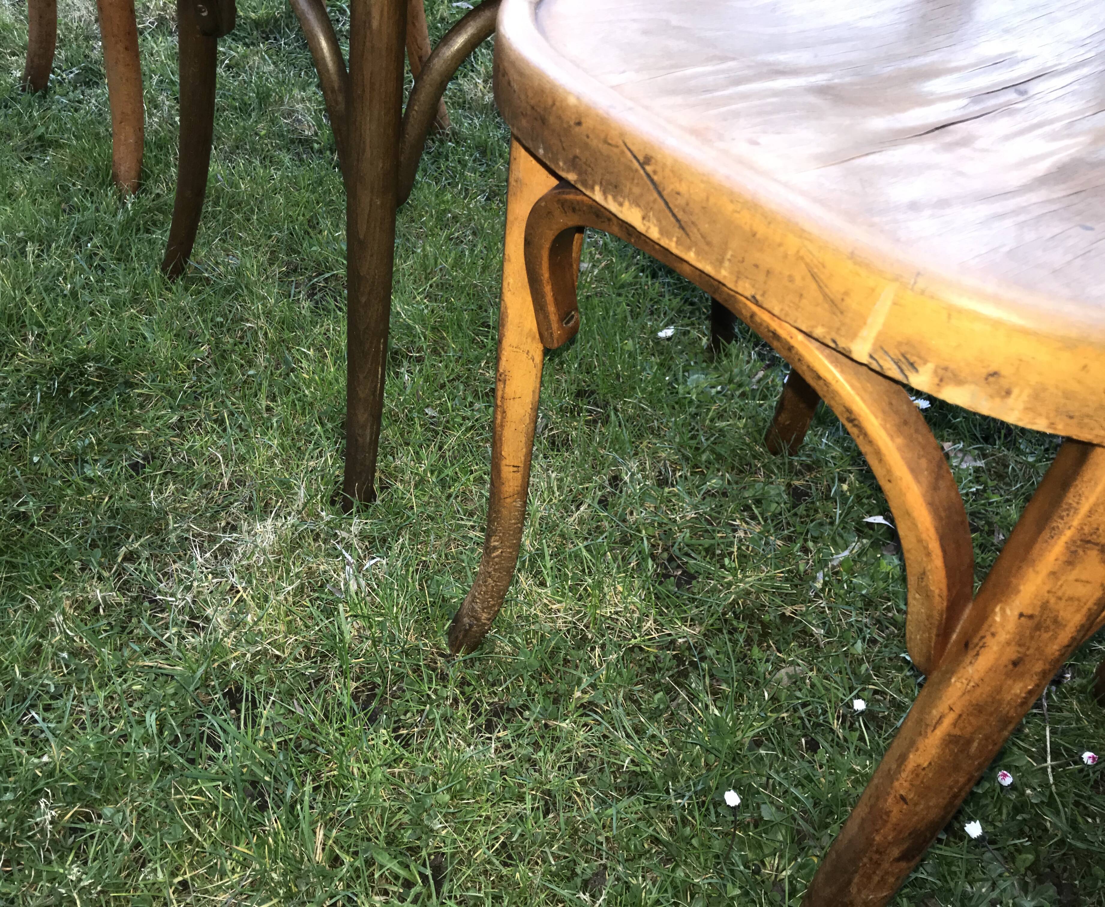Series of 4 mismatched bistro chairs