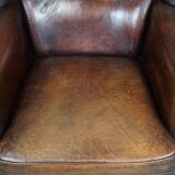 Large Sheepskin Leather Wingback Armchair with a Fixed Seat Cushion and a Stunning Patina
