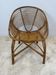 Vintage curved rattan armchair – 1960s/70s
