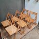 Series of 6 folding wooden chairs
