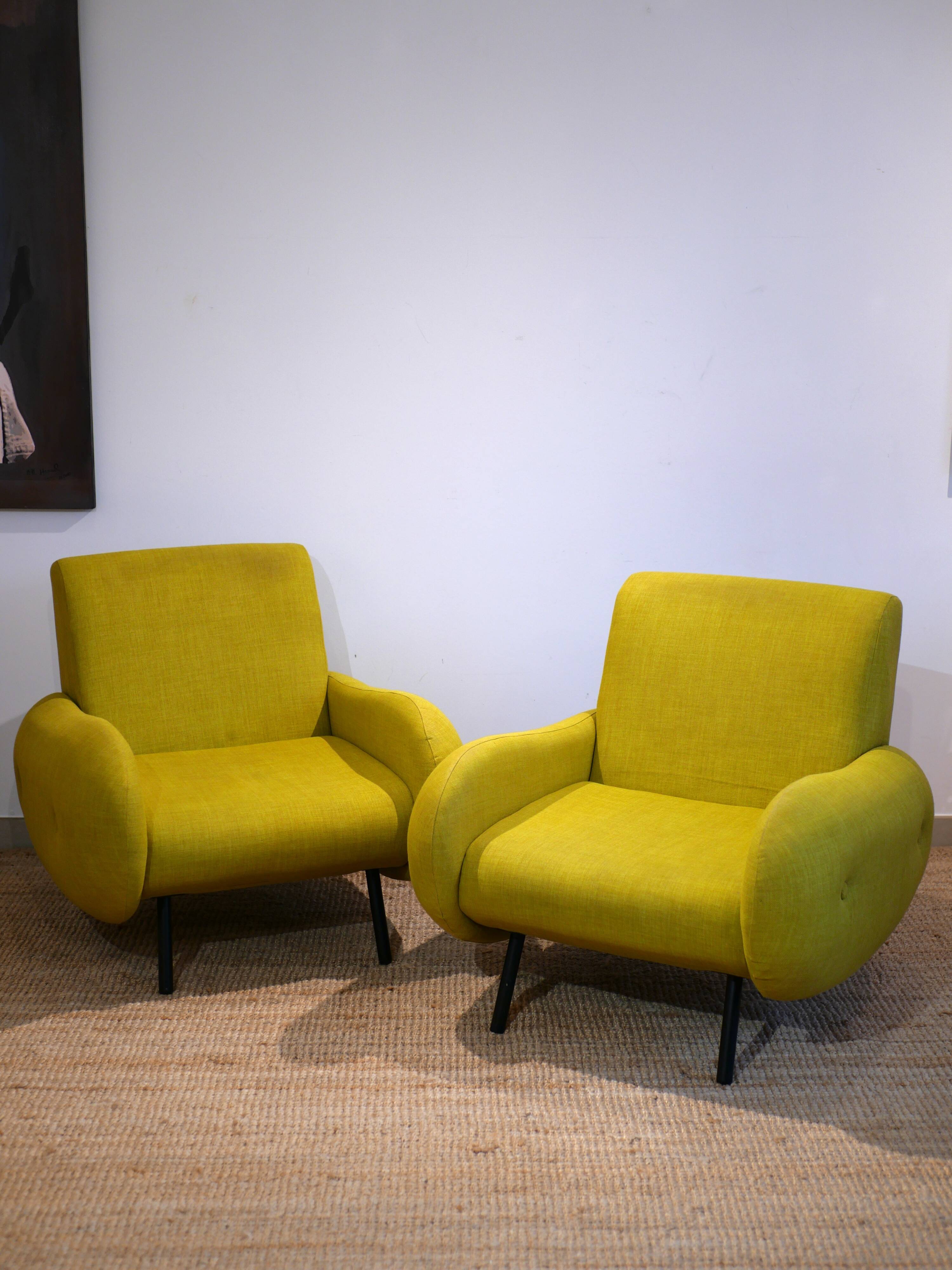Pair of low armchairs in 60s–70s style