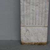 Old fireplace in white marble veined Louis XVI