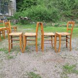 Suite of 9 straw chairs