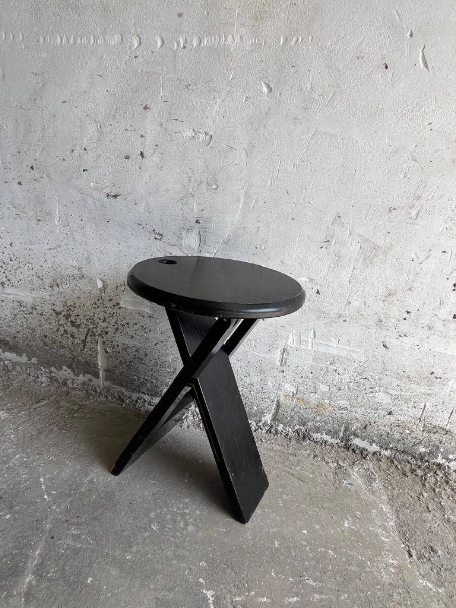 Suzy folding chair by Adrian Reed — Brown wooden mid-century minimalist folding chair, compact X-frame