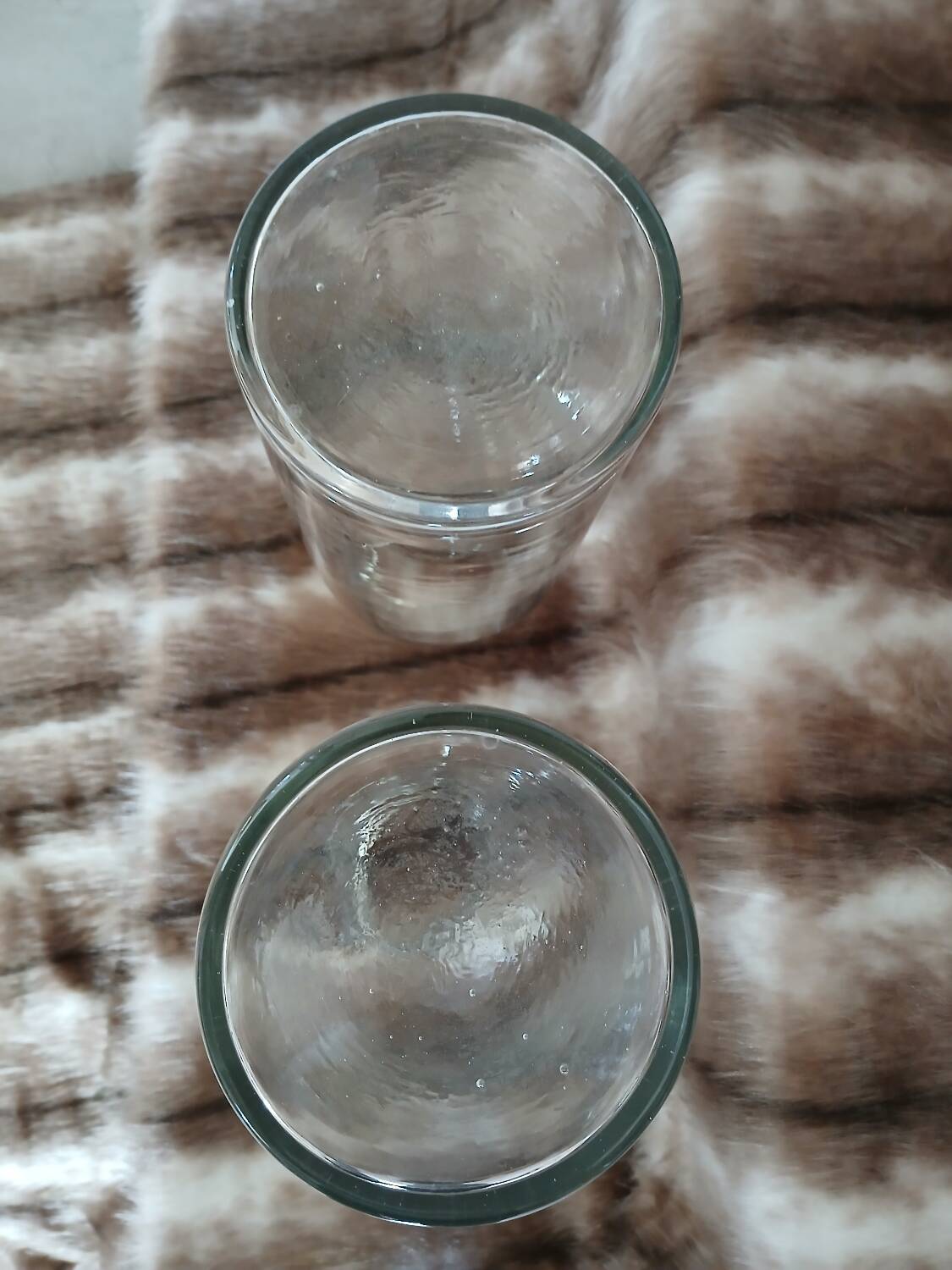 2 large antique transparent glass bottles