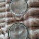 2 large antique transparent glass bottles
