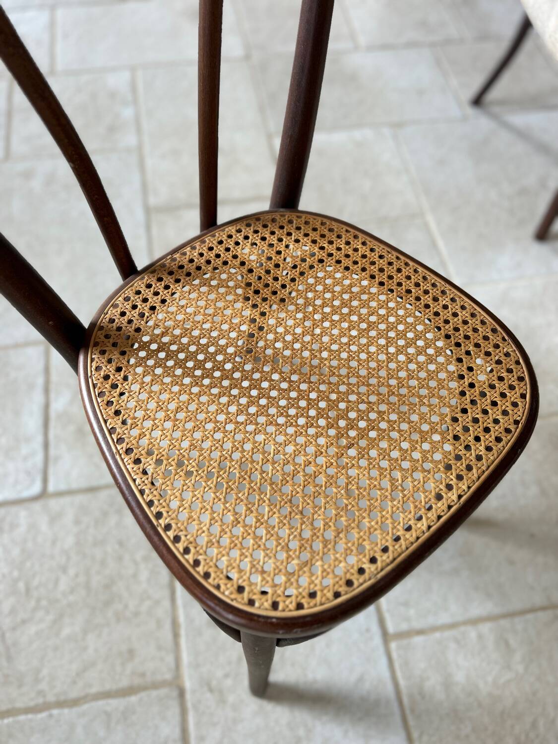 Vintage cane bistro chairs