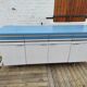 Kitchen cabinet in blue formica 4 doors 4 drawers