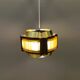 Danish hanging lamp, made in brass colored and brown metal, with yellowish hard pressed plastic deta