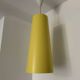 IKEA yellow metal cylindrical pendant light from the 2000s