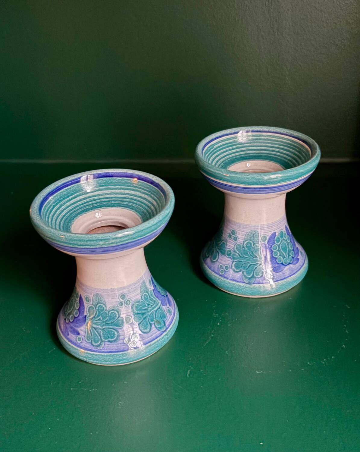 Two ceramic candlesticks
