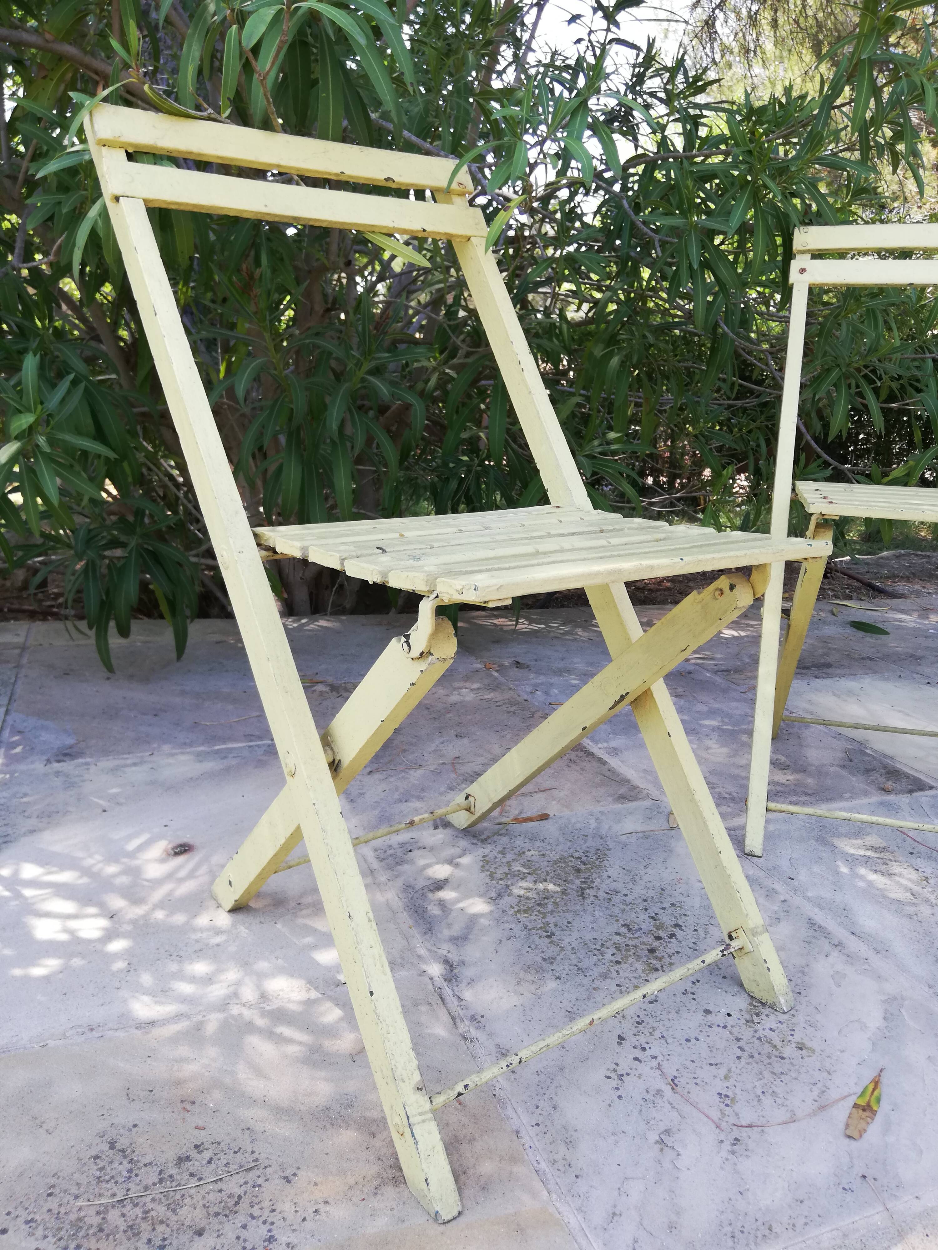 Two folding garden chairs