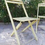 Two folding garden chairs