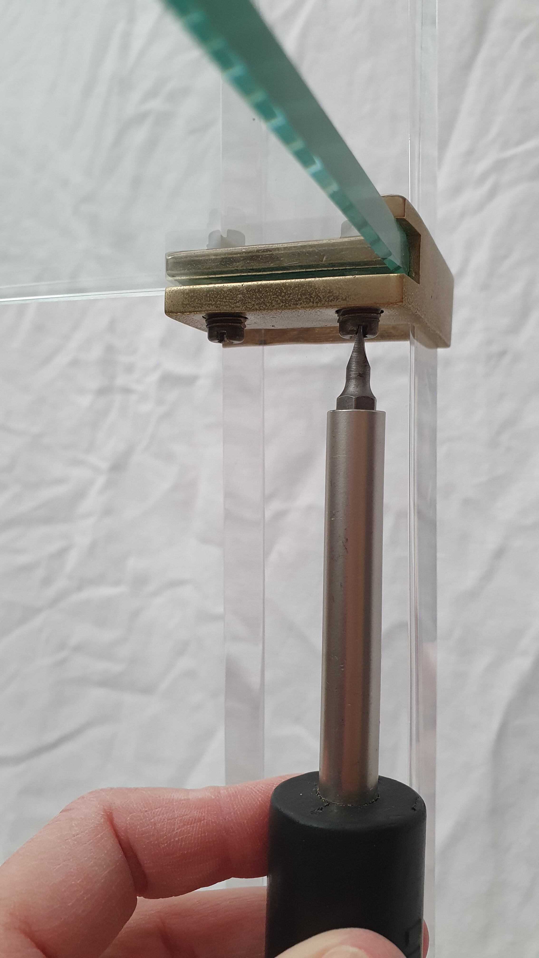 Rolling glass and plexiglass shelf by Pierre Vandel