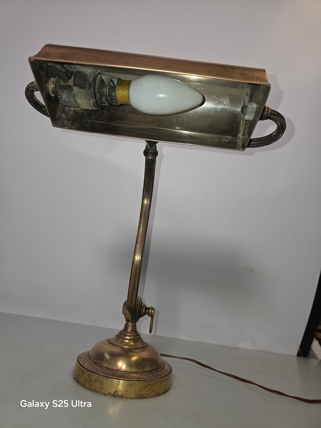 Antique brass desk lamp from a notary.