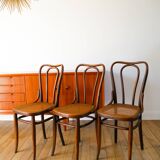 Set of 3 bistro chairs in wood and canework signed J. Kohn, Made in Austria, 20th century