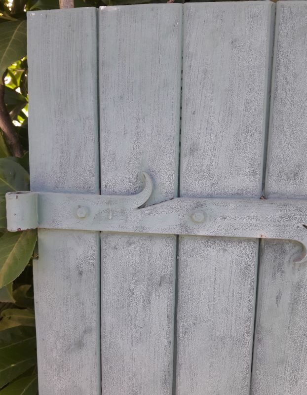 Pair of wooden iron hanging shutters
