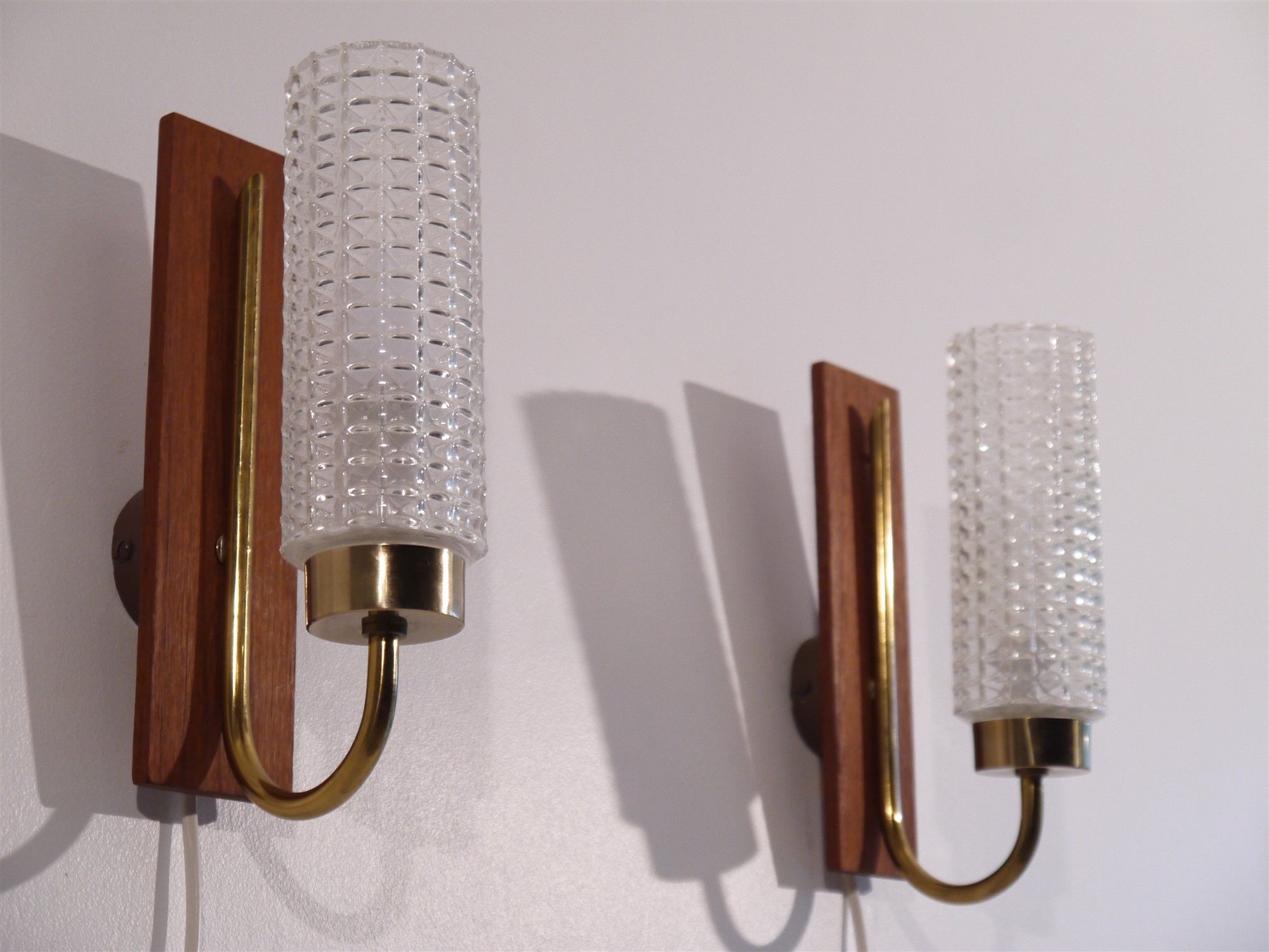 Pair of Scandinavian vintage teak and glass appliques
