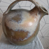Original round earthenware jug.