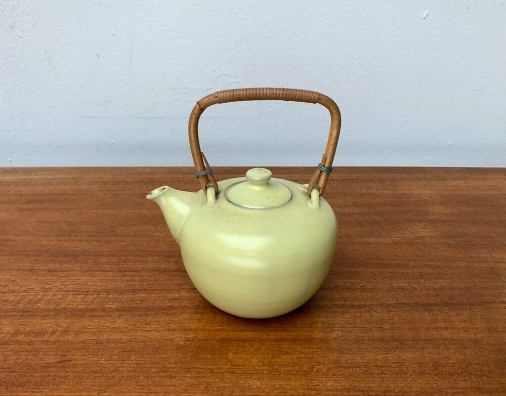 Mid-century ceramic teapot with bamboo handle, 1960s.