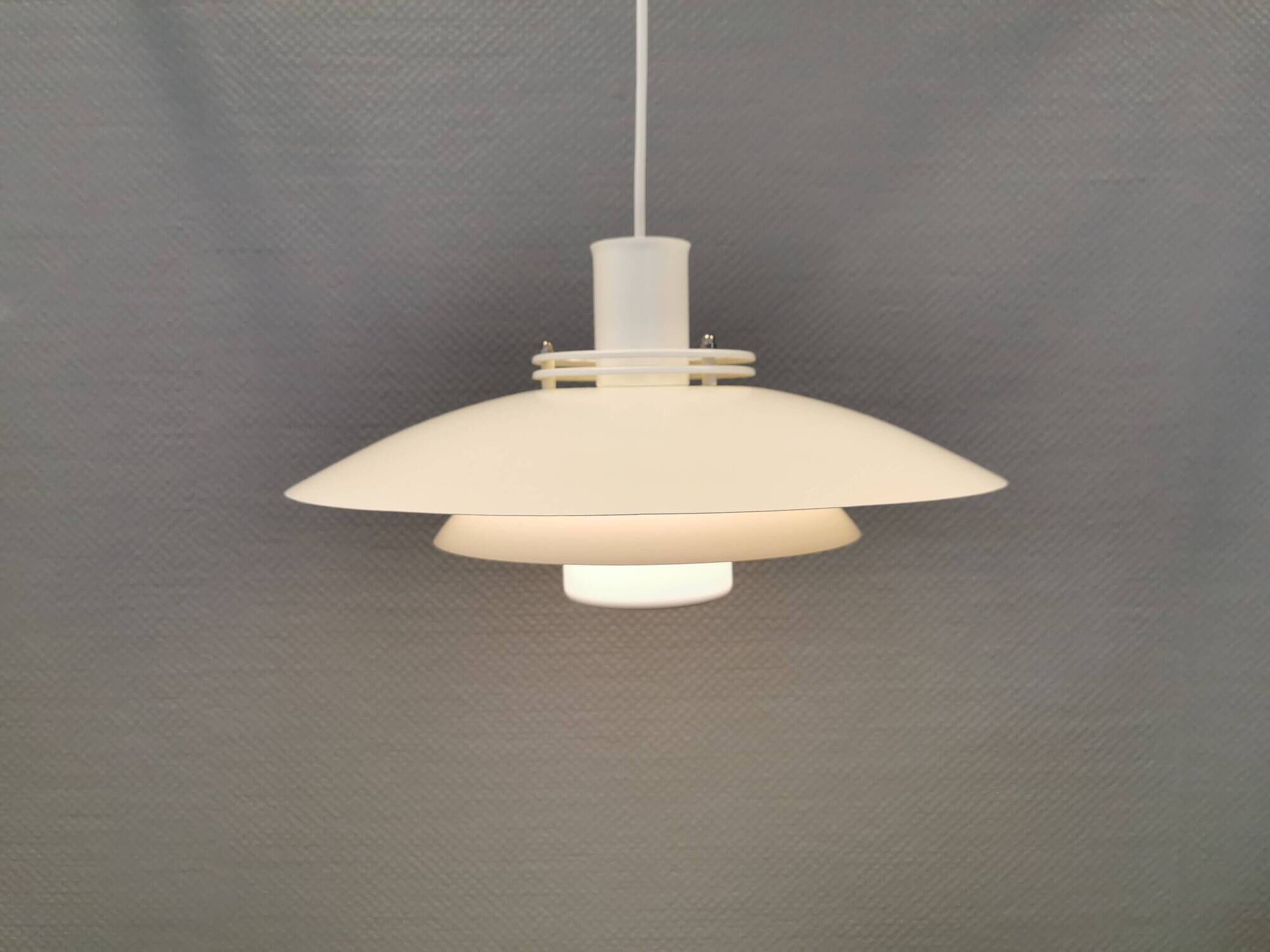 FormLight hanging lamp with multiple layers of shades, a Danish quality product from the 80s.