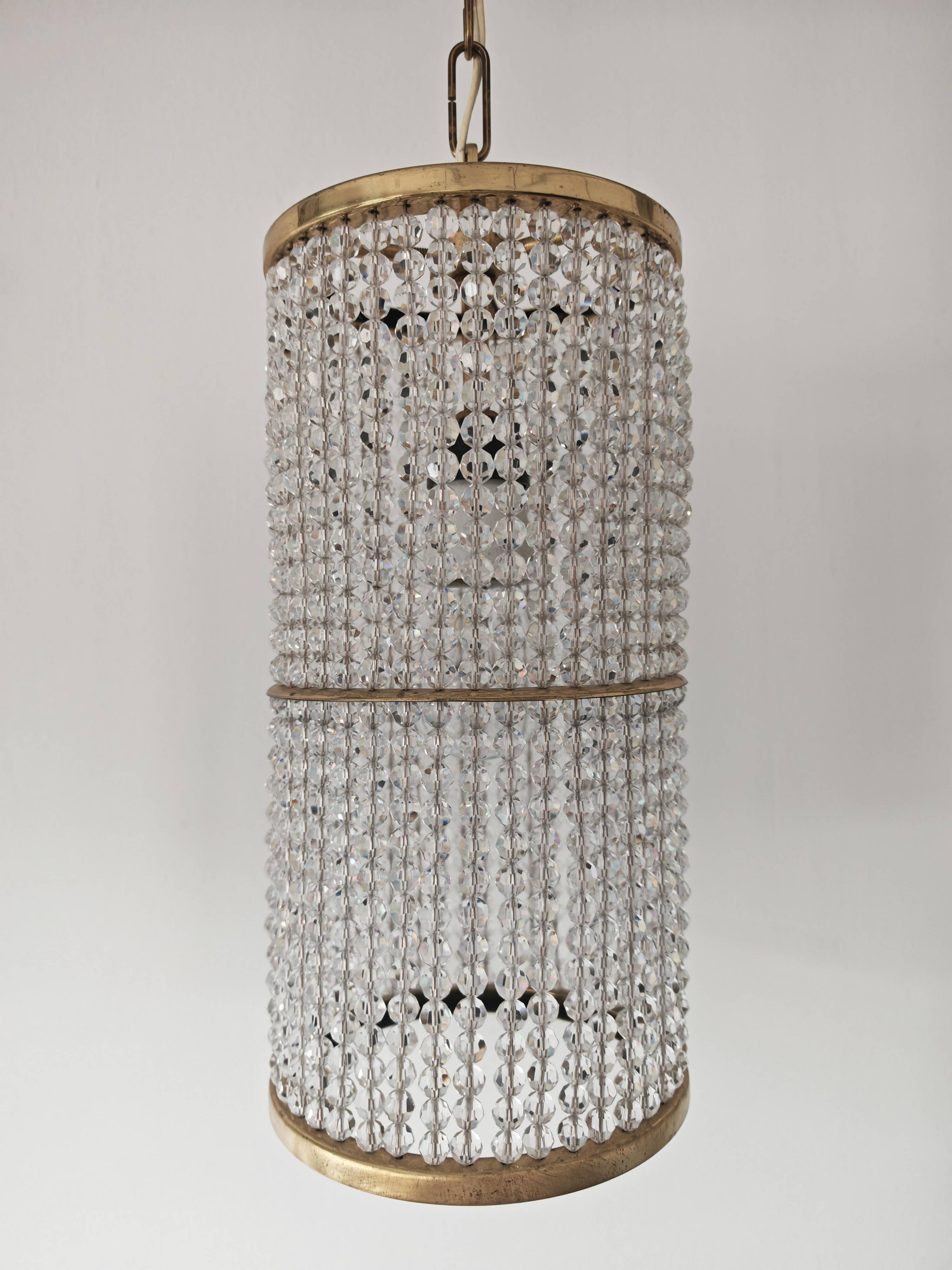 Set of 3 cylindrical crystal chandeliers in mid-century modern style attributed to Lobmeyr.