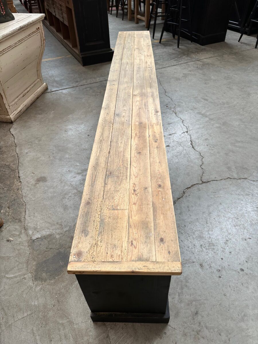 Old workshop furniture transformed into a TV unit.