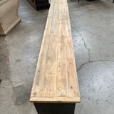 Old workshop furniture transformed into a TV unit.