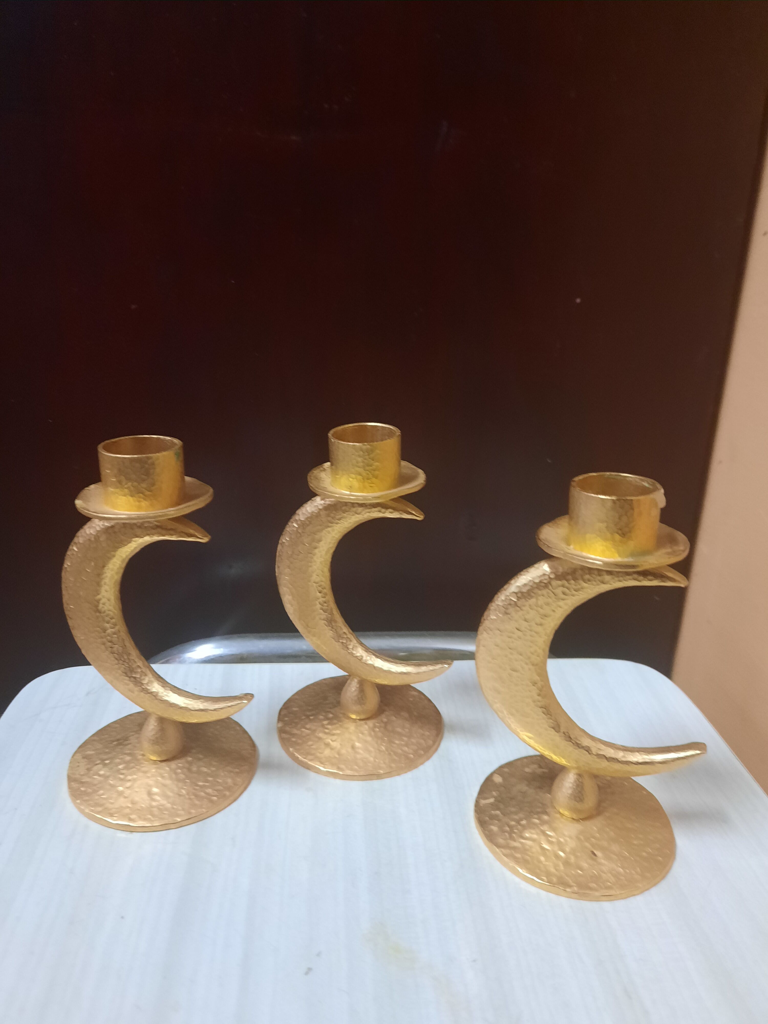 Set of 3 golden candlesticks created by Édouard Rambaud