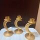 Set of 3 golden candlesticks created by Édouard Rambaud