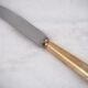 12 table knives model Baguette, golden handles, excellent condition.