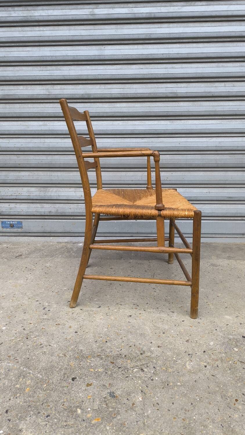 Early 19th century stepped back armchair