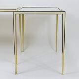 A pair of brass and white mirror tables from Vereinigte Werkstätten, Germany, 1970s.