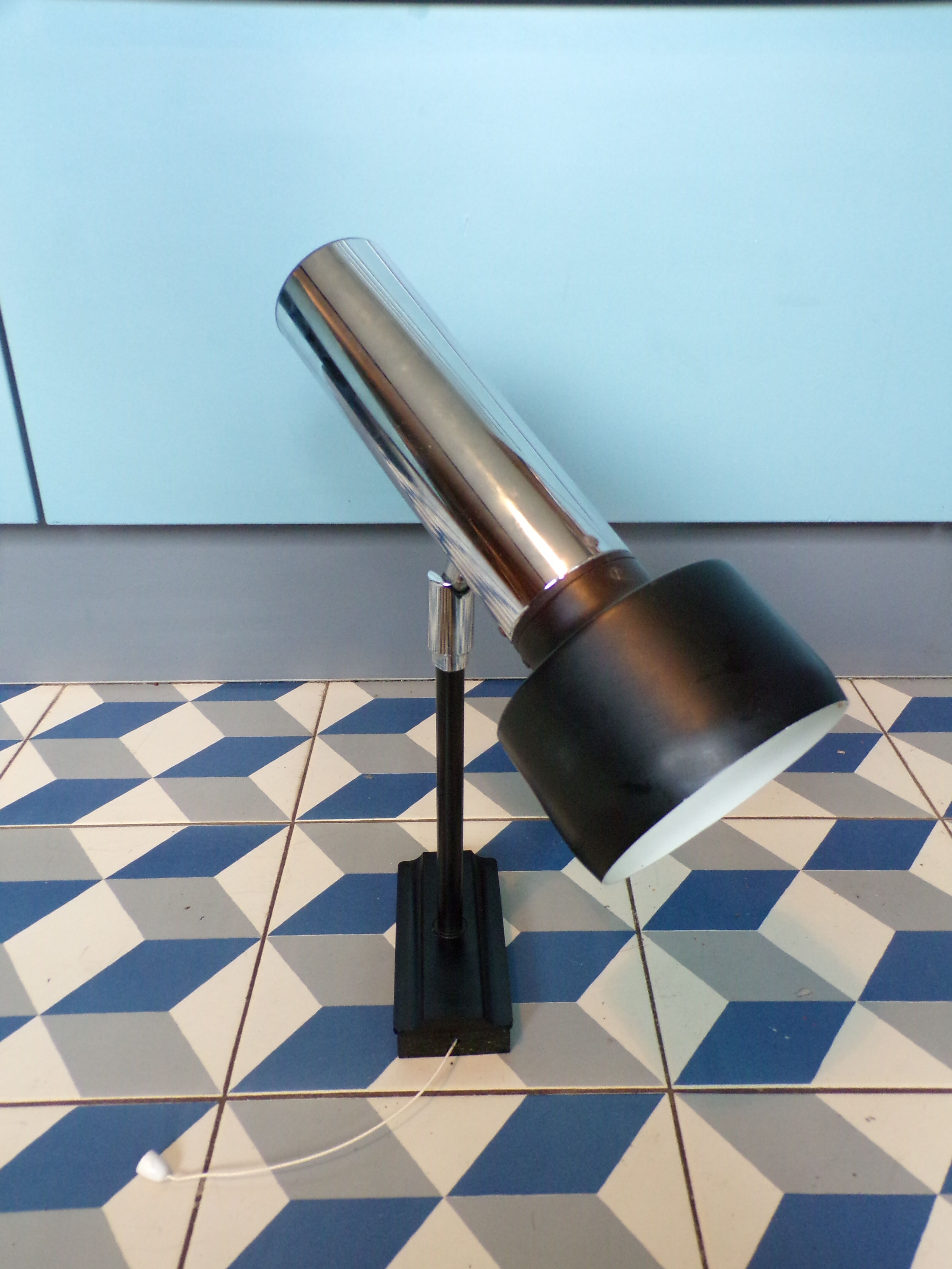 Space age articulated sconce