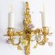 Pair of bronze wall lights with flower decoration. Circa 1880.