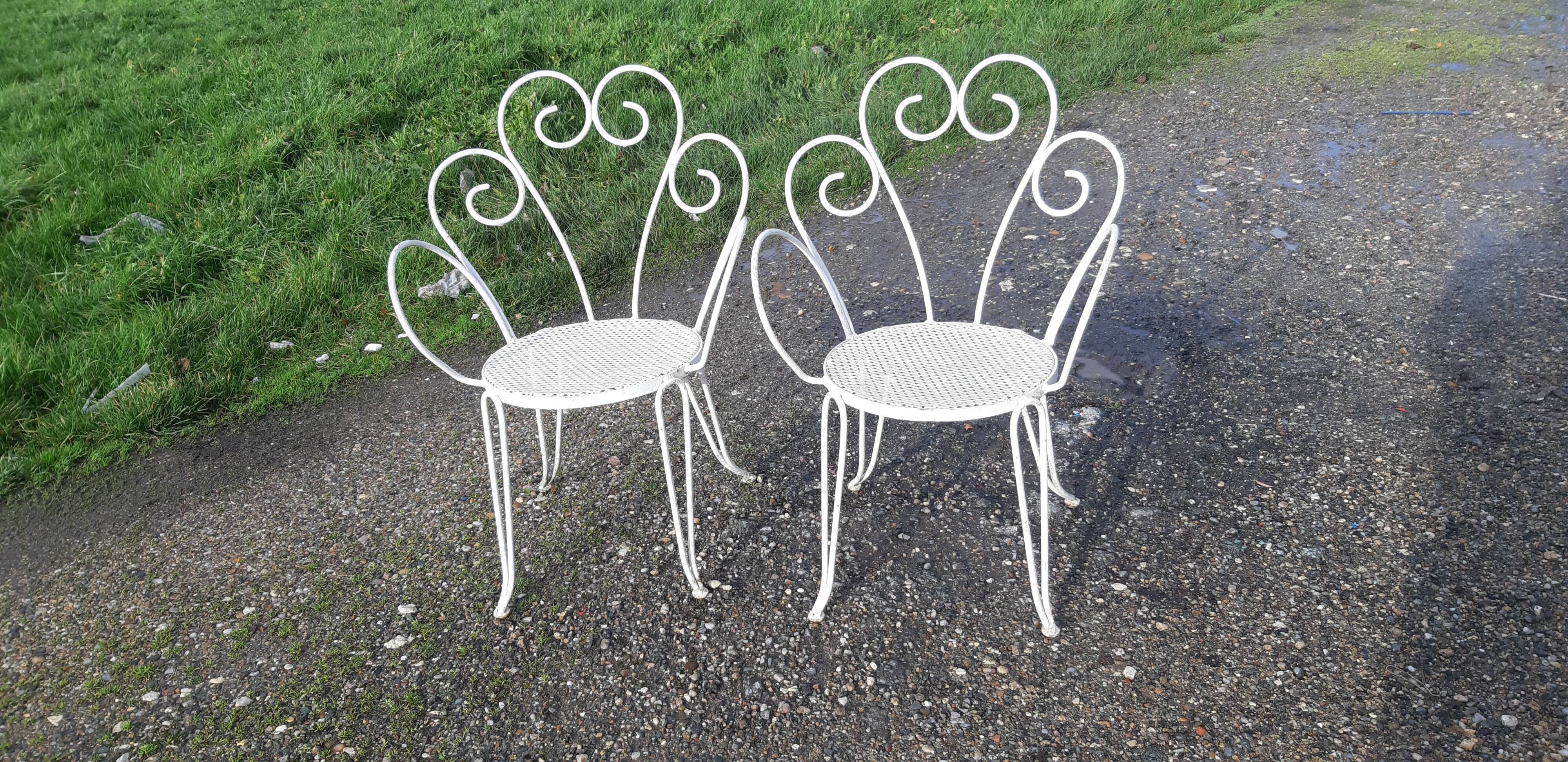 Paire de fauteuils de jardin 1900 en fer forgé