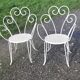 Paire de fauteuils de jardin 1900 en fer forgé