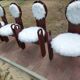 Set of 4 vintage dining chairs in brown pine and white fur by Szedleczky (1970s)