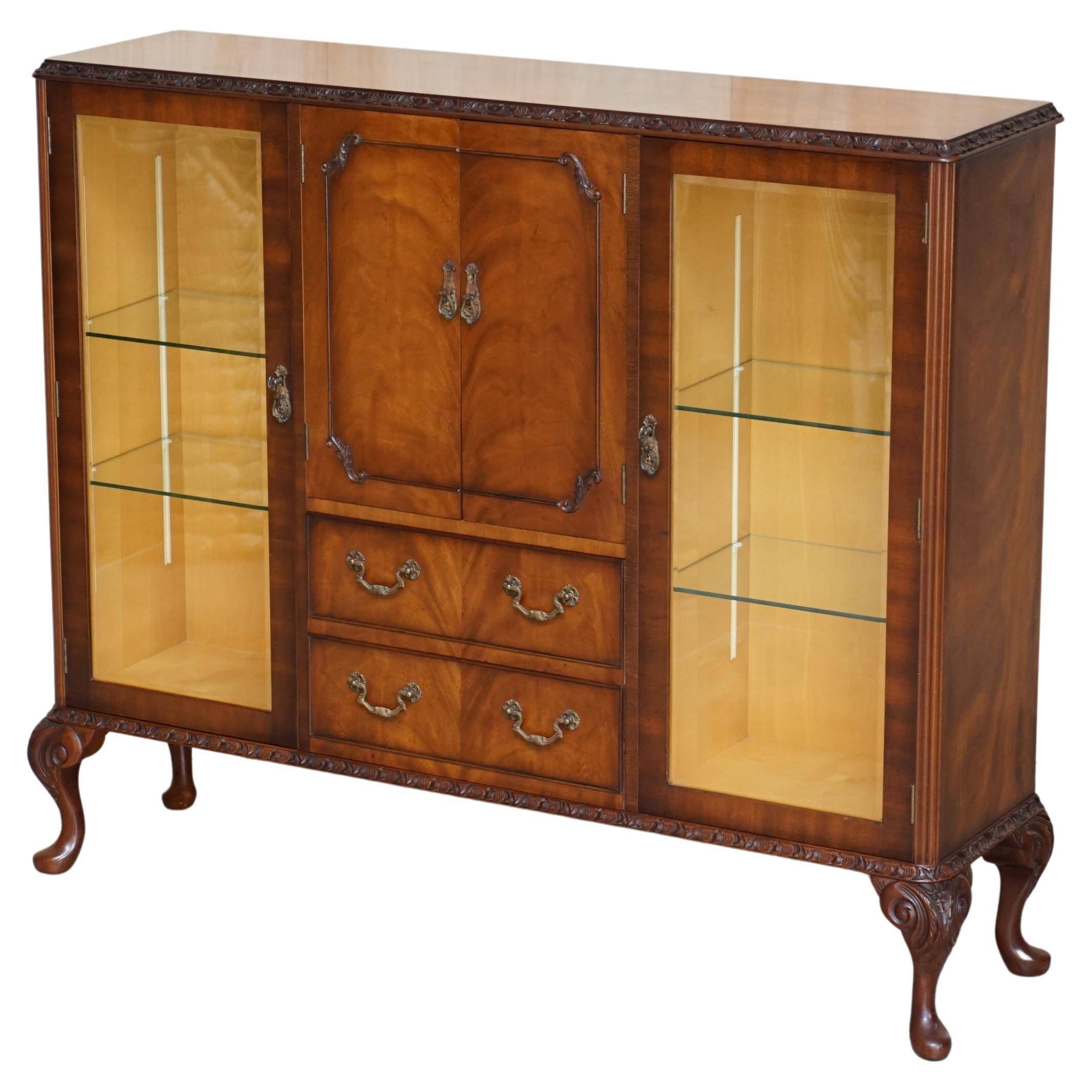 Vintage buffet display cabinet circa 1940 in flame mahogany and satinwood.