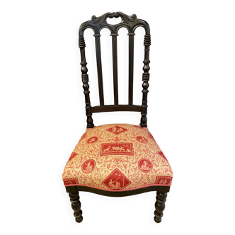 Fireplace or changing chair period 1900 in black lacquered wood and printed fabric