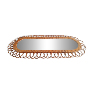 Large oval mirror from the 60s in rattan.