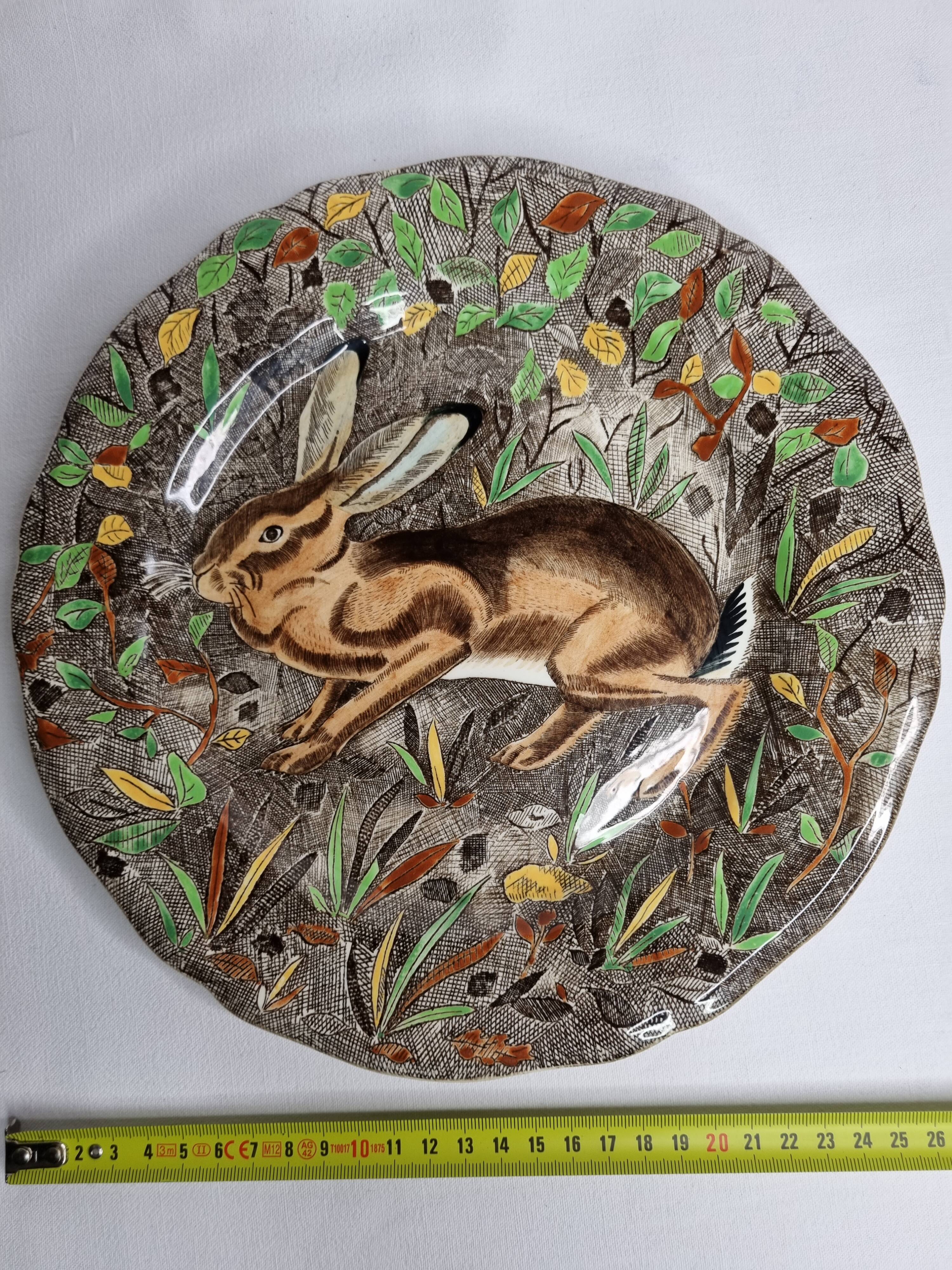 Plate in Gien earthenware, Rambouillet model, "hare" signed JB in the décor