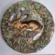Plate in Gien earthenware, Rambouillet model, "hare" signed JB in the décor