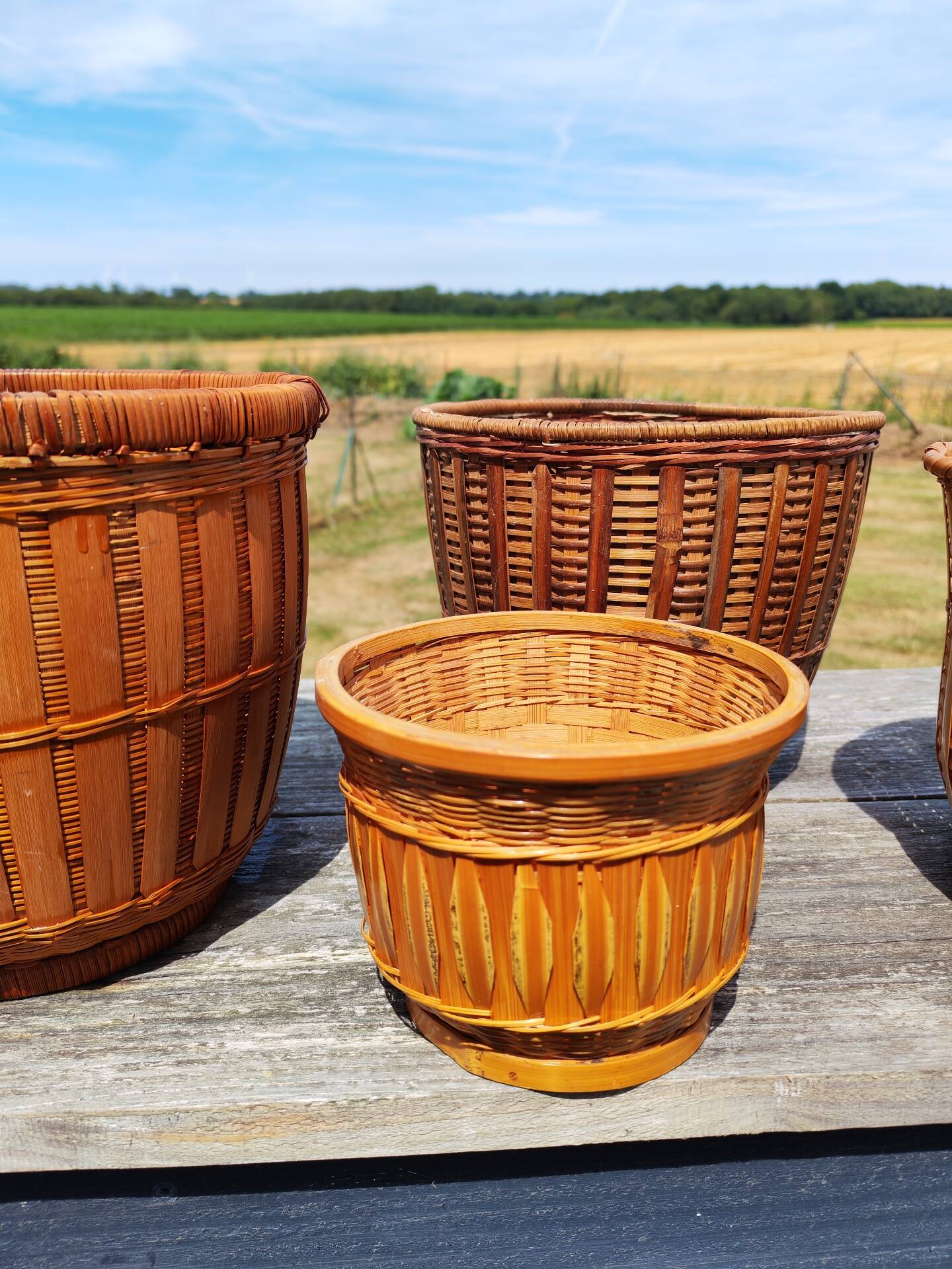 Lot de 4 cache pots en rotin vintage 