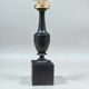 Murex shell on a turned blackened wooden base, 19th century.